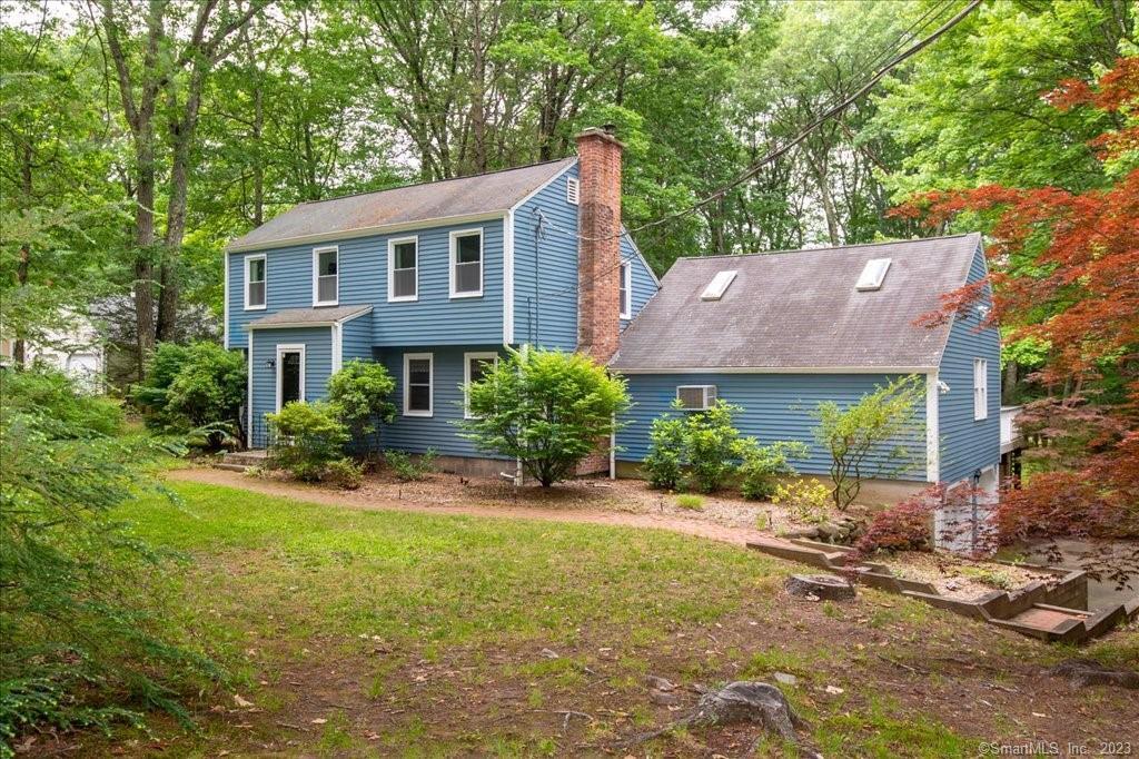 37 Climax Road Simsbury, CT 06070 - Photo 1 of 1 front view of house with a yard