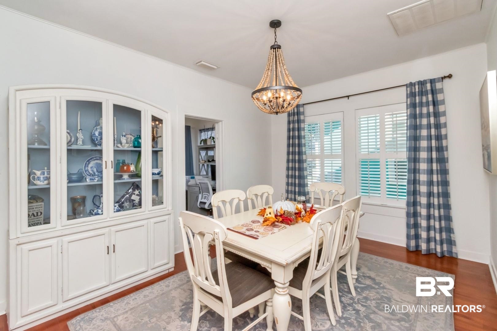 116 Item Avenue Mobile, AL 36607 - Photo 10 of 33 Dining space with hardwood / wood-style flooring and an inviting chandelier