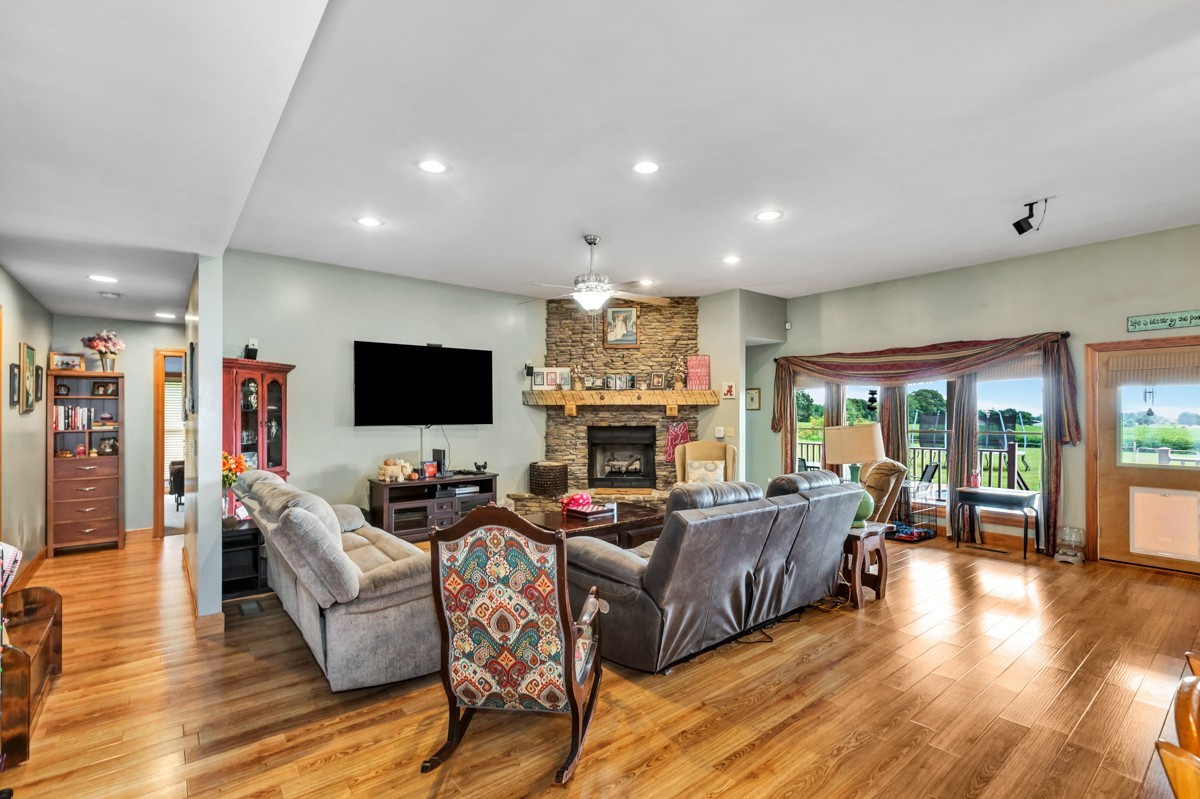 48 Old Baptist Road Ardmore, TN 38449 - Photo 8 of 41 a living room with fireplace furniture and a flat screen tv