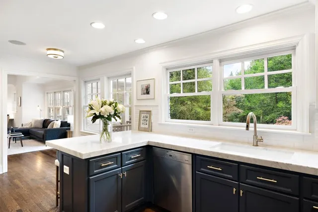 a balcony with furniture and wooden floor