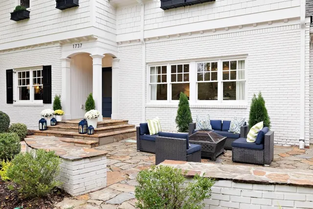 a building outdoor space with patio furniture