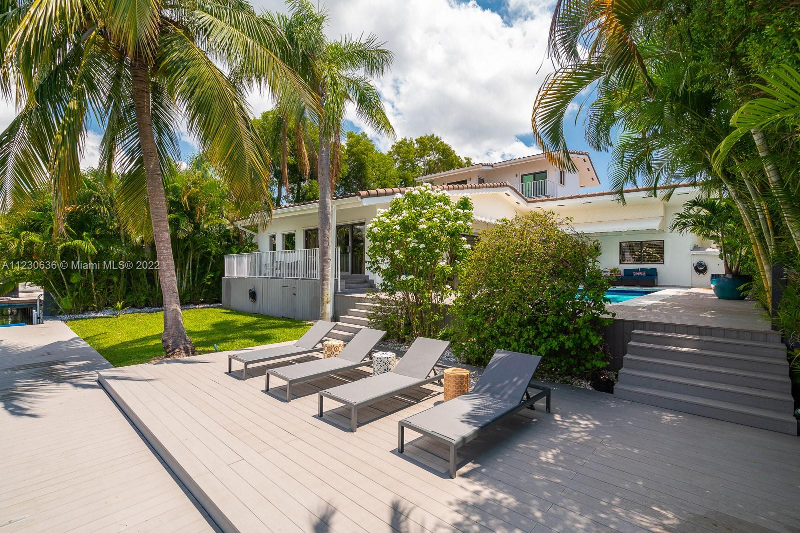 1922 Northeast 119th Road North Miami, FL 33181 - Photo 29 of 42 a view of a patio with swimming pool
