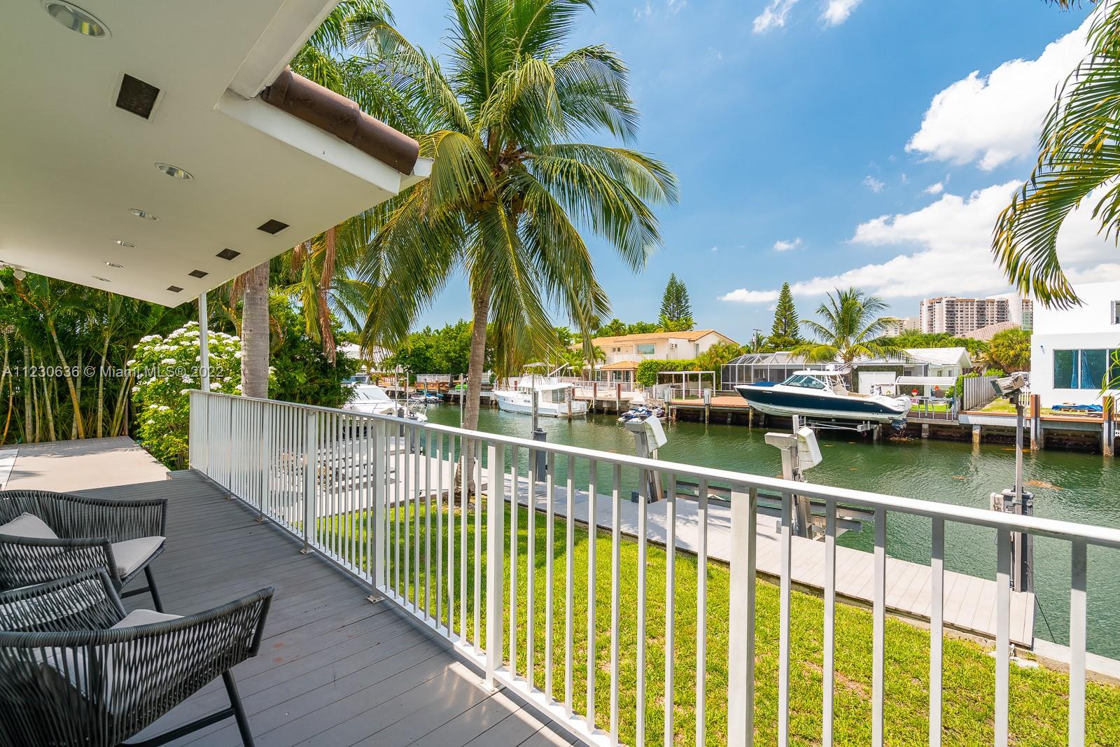 1922 Northeast 119th Road North Miami, FL 33181 - Photo 31 of 42 a view of small house with outdoor seating