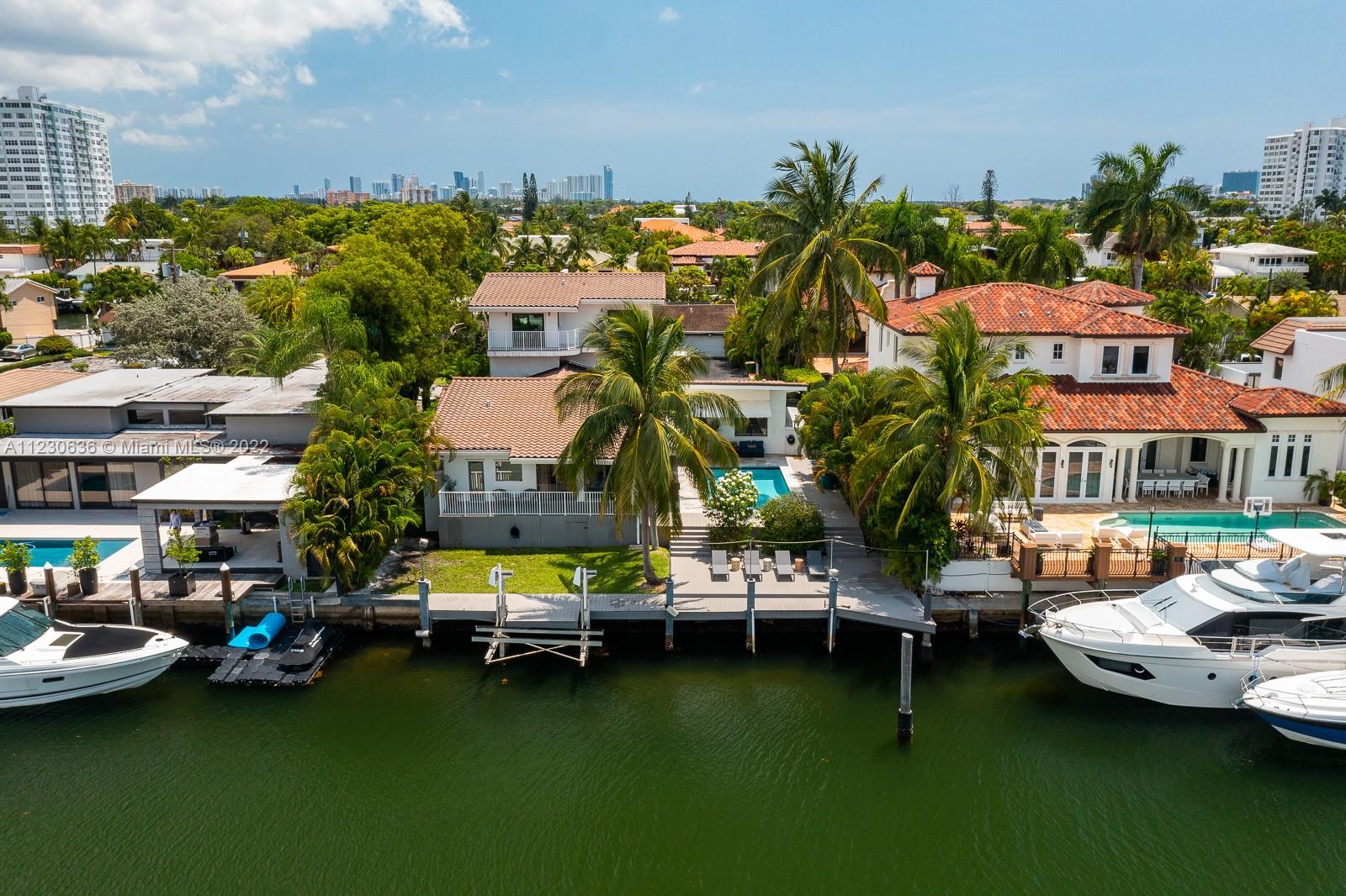 1922 Northeast 119th Road North Miami, FL 33181 - Photo 34 of 42 a view of a lake with cars park