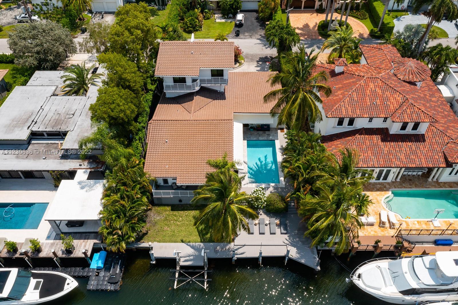 1922 Northeast 119th Road North Miami, FL 33181 - Photo 35 of 42 an aerial view of a house with garden space and street view
