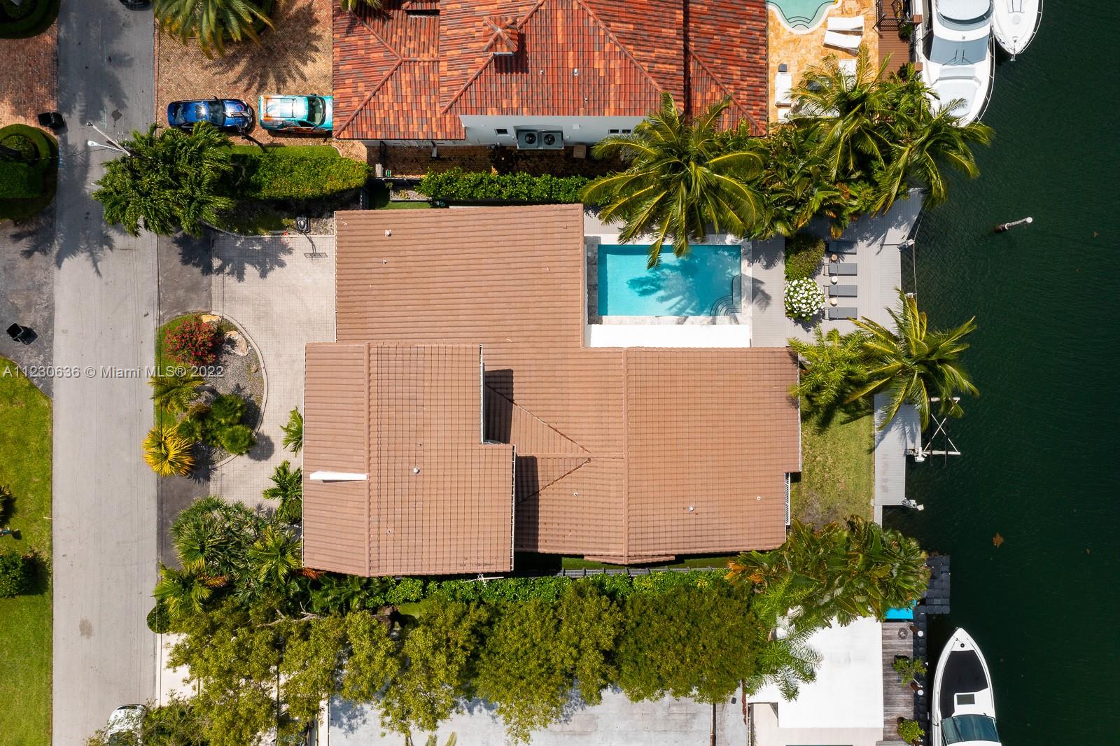 1922 Northeast 119th Road North Miami, FL 33181 - Photo 41 of 42 an aerial view of a house with pool yard and outdoor seating