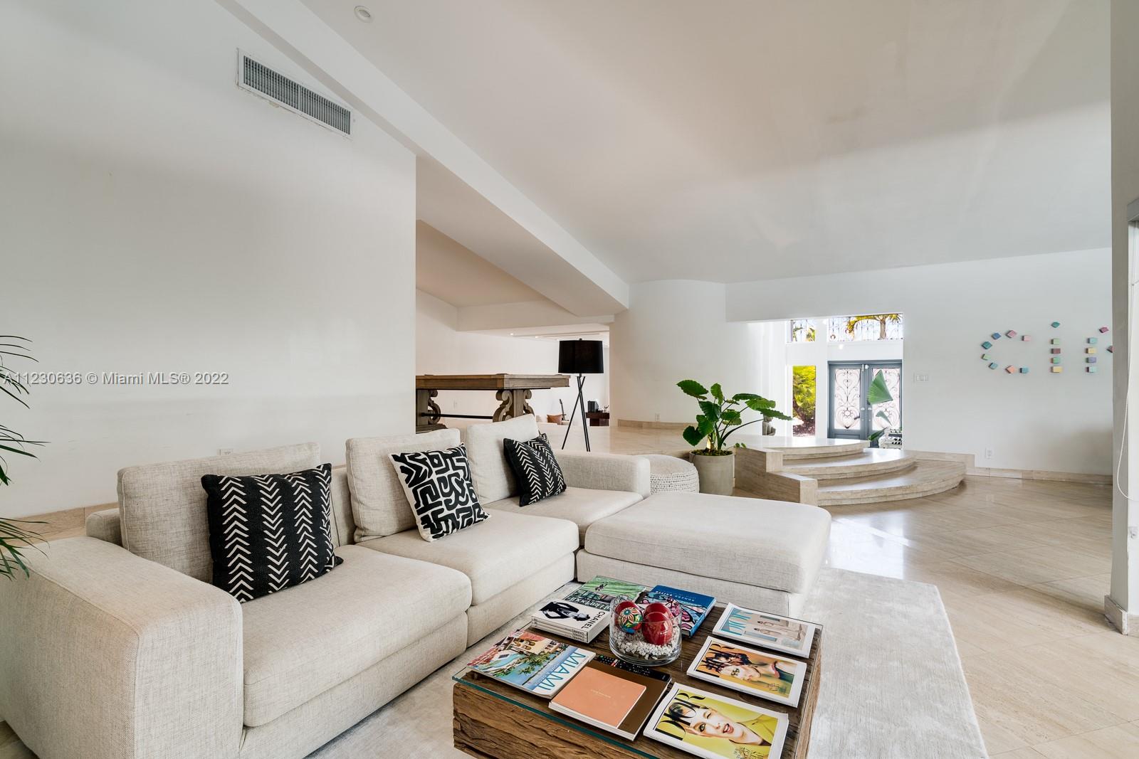 1922 Northeast 119th Road North Miami, FL 33181 - Photo 6 of 42 a living room with furniture and a couch