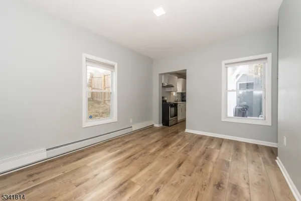an empty room with windows