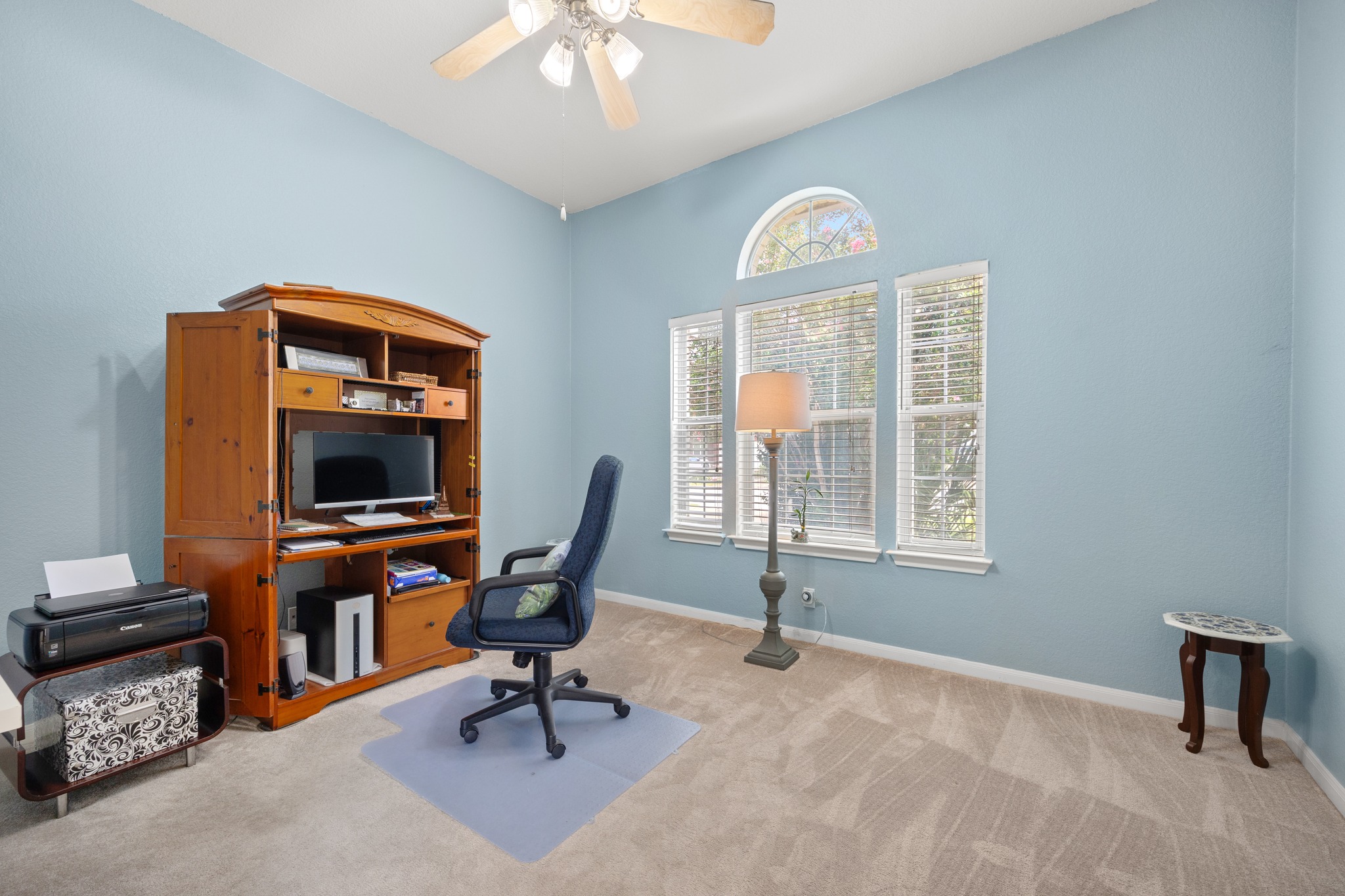 1108 Springbrook Road Pflugerville, TX 78660 - Photo 6 of 37 A quiet room with high ceilings offers a dedicated space for work or study.