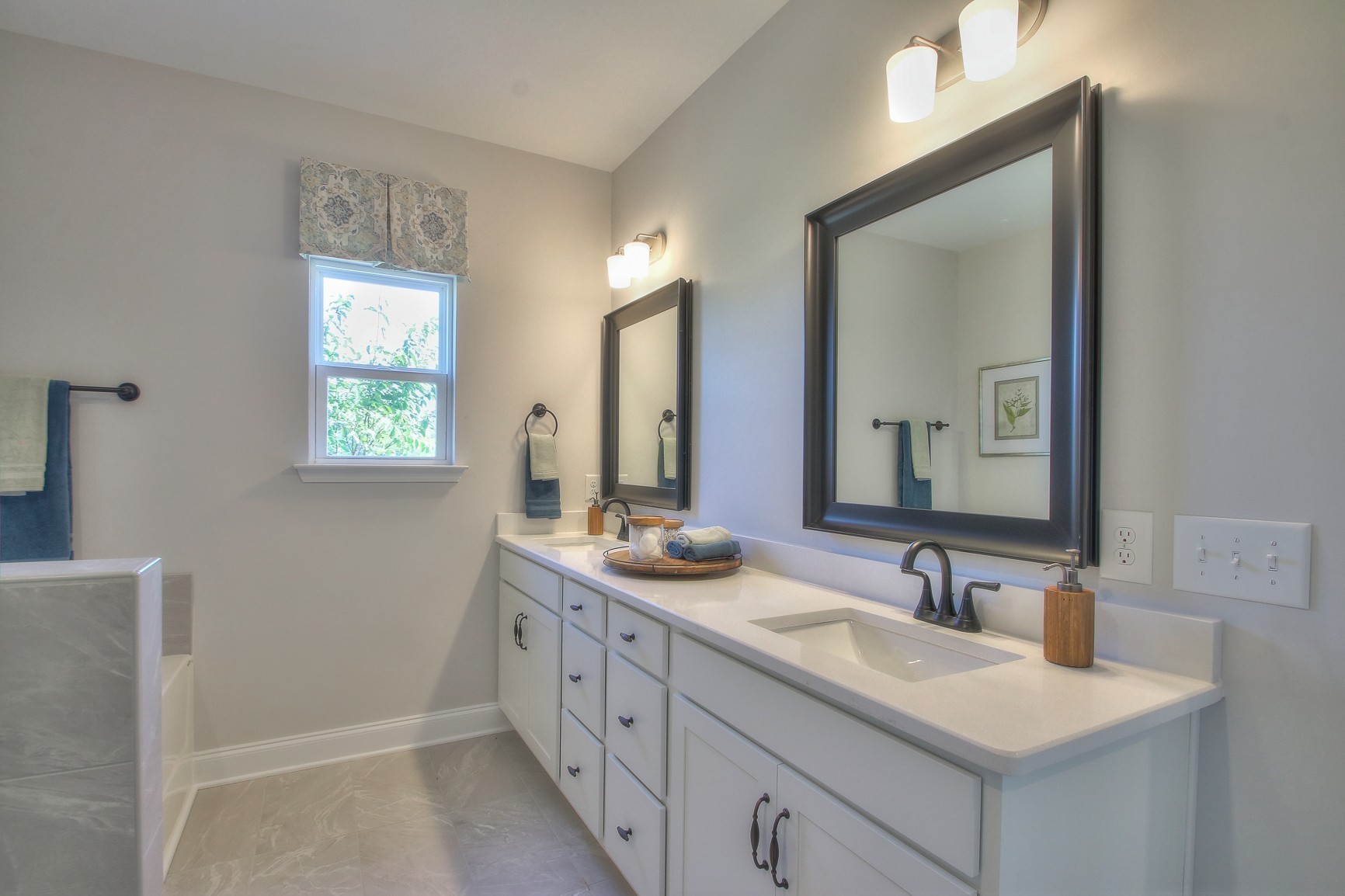 3117 Arbor Valley Rd Spring Hill Spring Hill, TN 37174 - Photo 17 of 21 a bathroom with double sink and a mirror