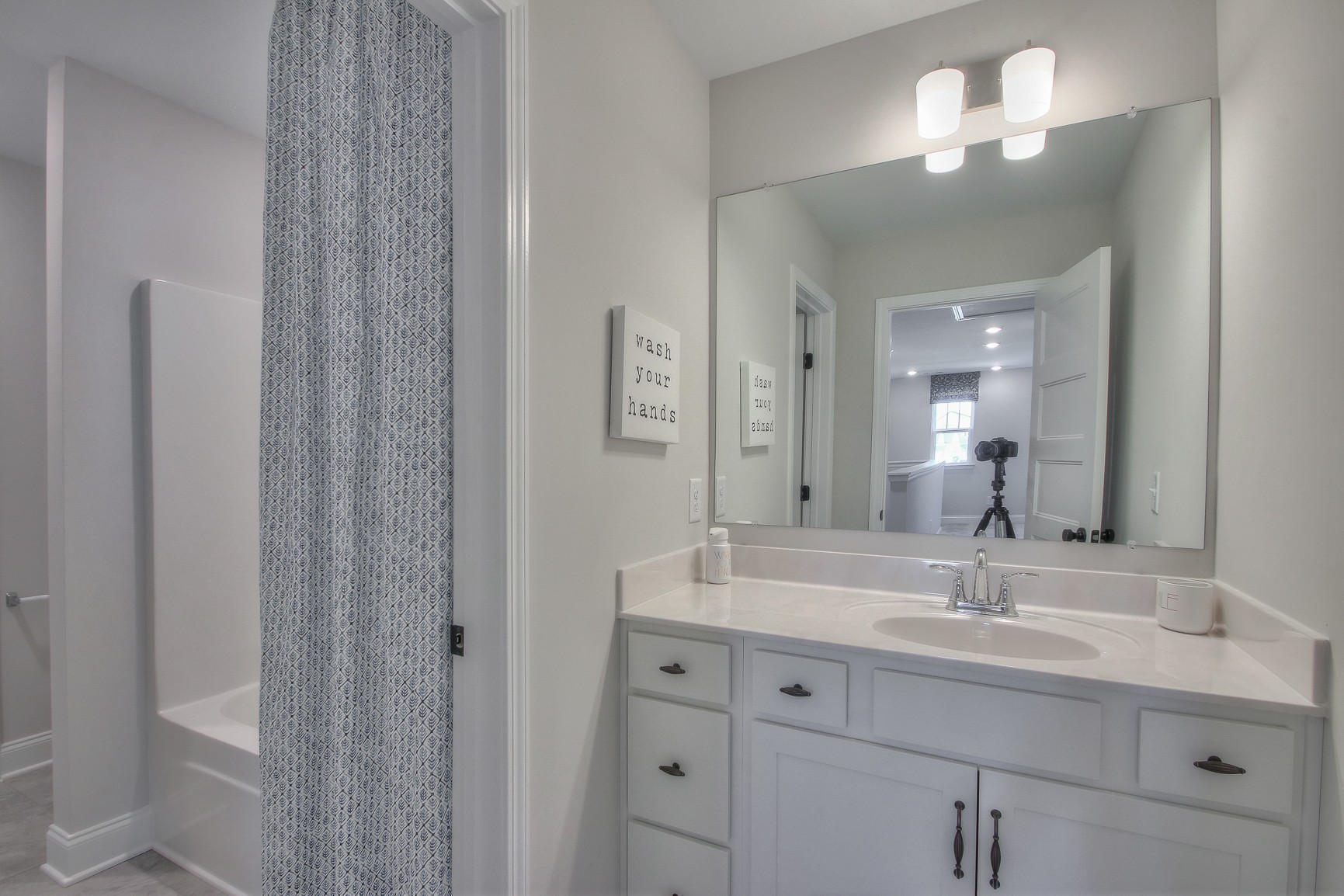 3117 Arbor Valley Rd Spring Hill Spring Hill, TN 37174 - Photo 20 of 21 a bathroom with a double vanity sink and a mirror