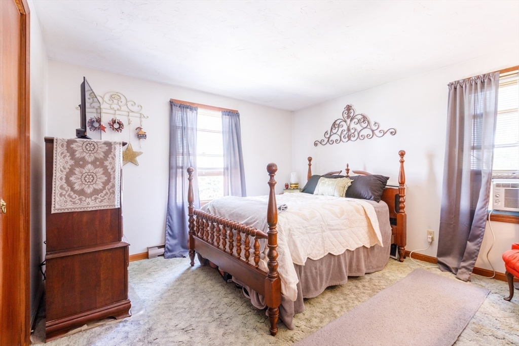 170 Perry Avenue, Unit 3A Worcester, MA 01610 - Photo 11 of 16 a bed room with a bed and a window