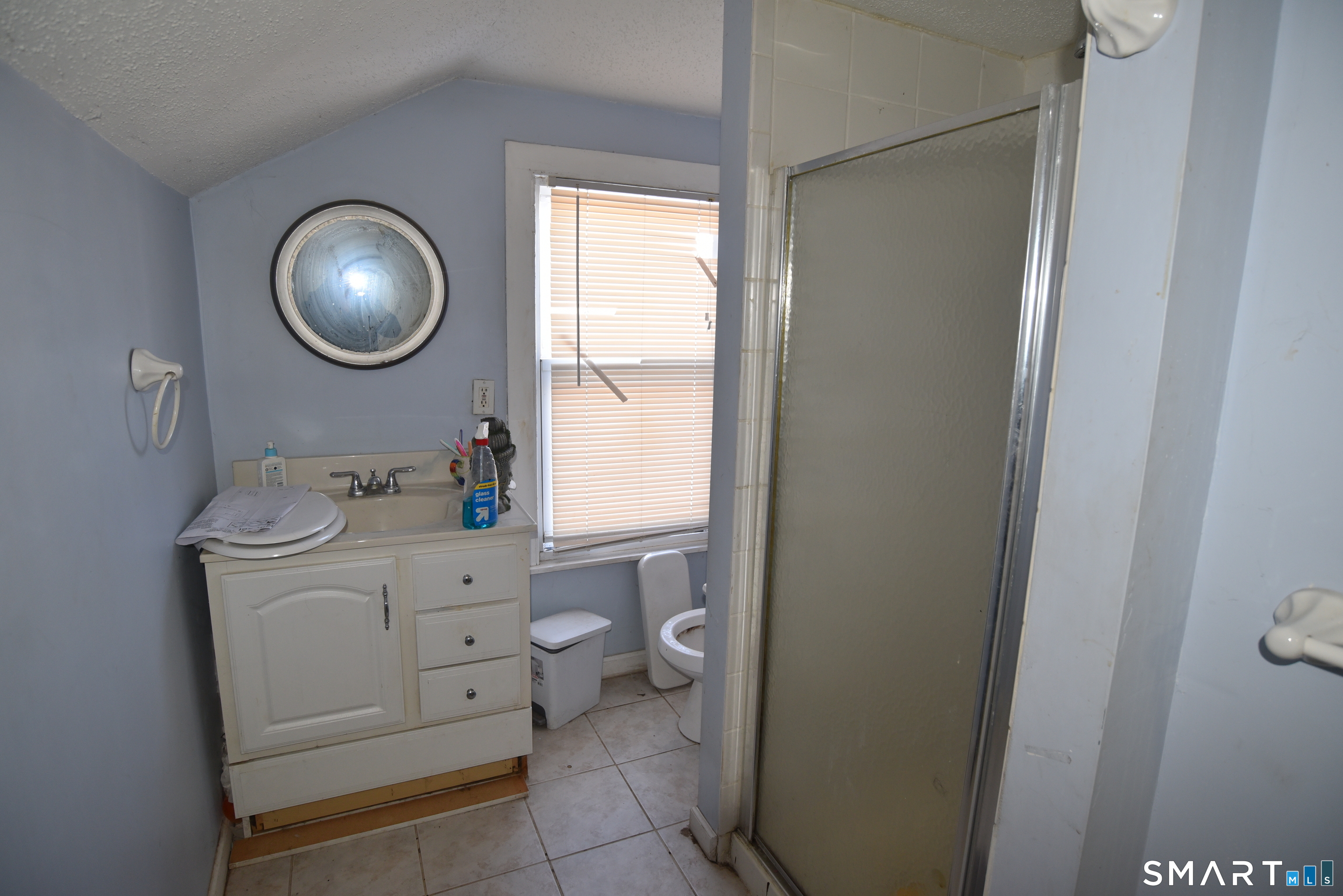 29 Bingham Street Bristol, CT 06010 - Photo 12 of 15 a bathroom with a toilet sink and mirror