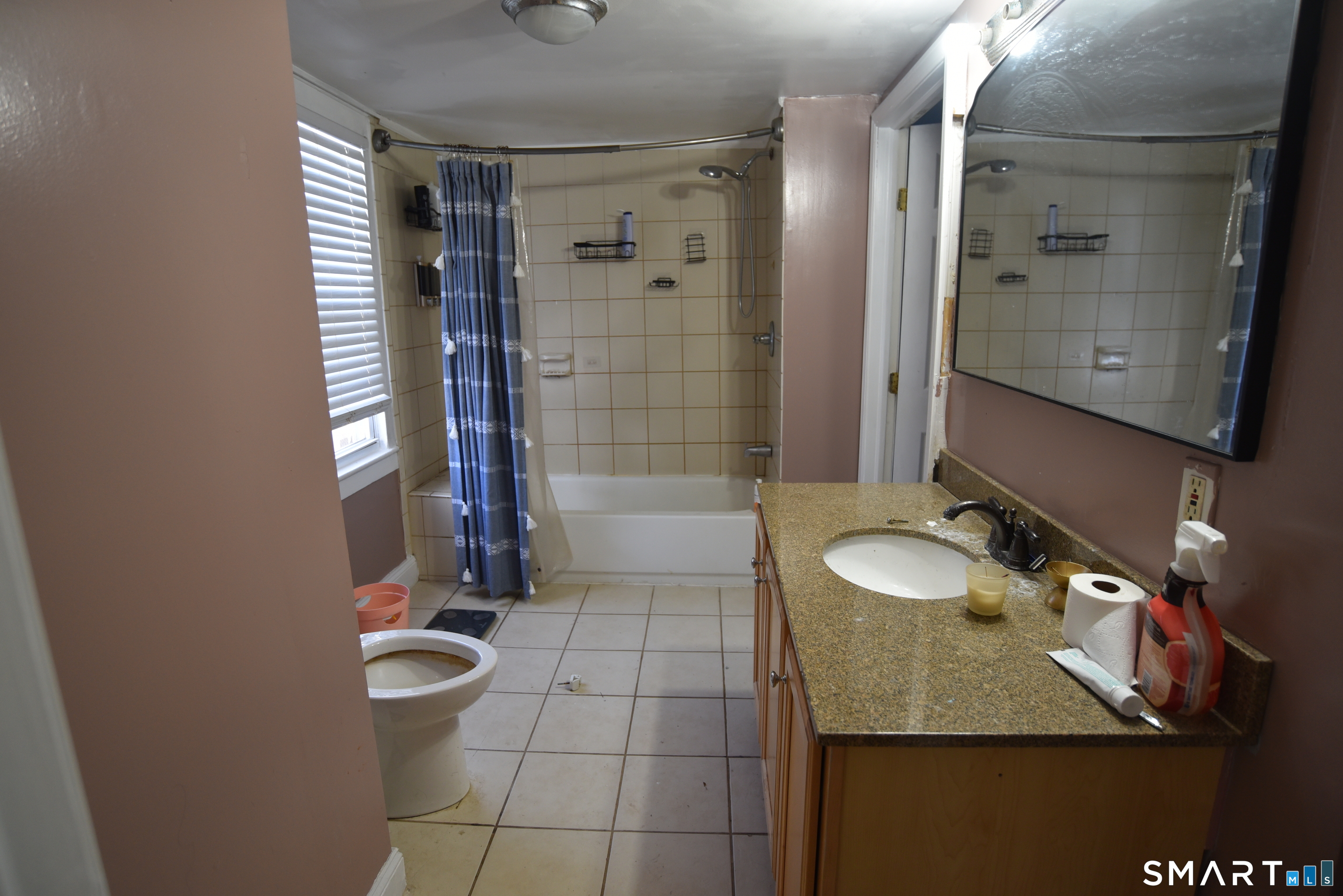 29 Bingham Street Bristol, CT 06010 - Photo 5 of 15 a bathroom with a sink a toilet and shower