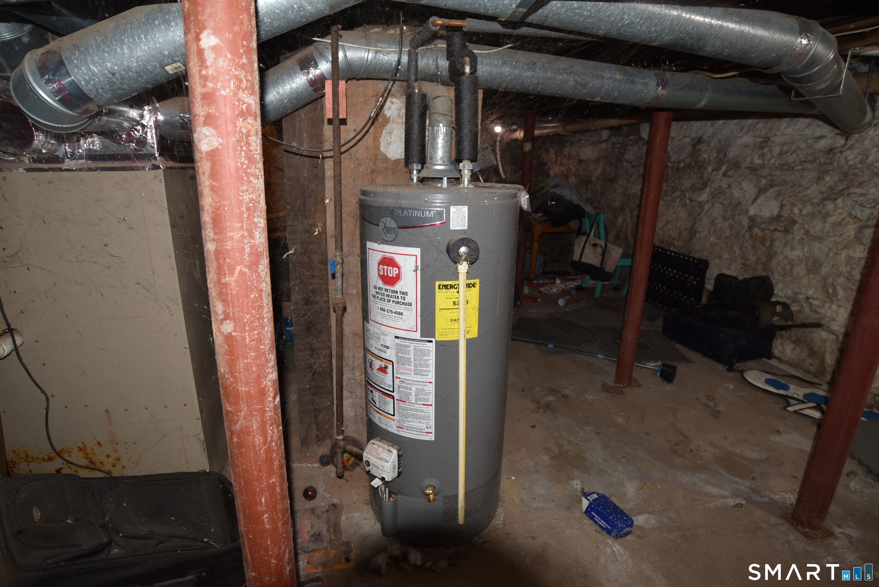 29 Bingham Street Bristol, CT 06010 - Photo 9 of 15 a close view of water heater room