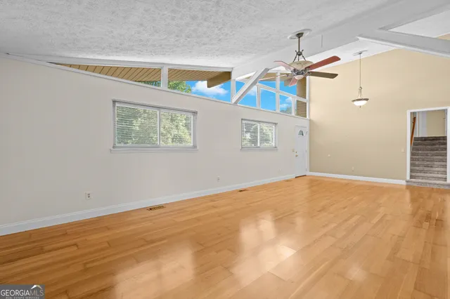 a kitchen that has a sink and a stove in it