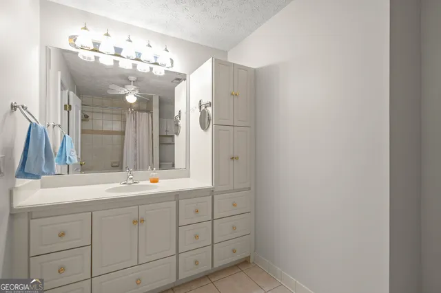 a view of a swimming pool with a yard