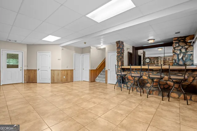 a view of a lake with houses in the background