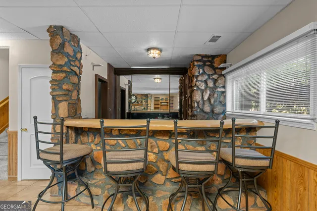 a park with lots of green space and trees