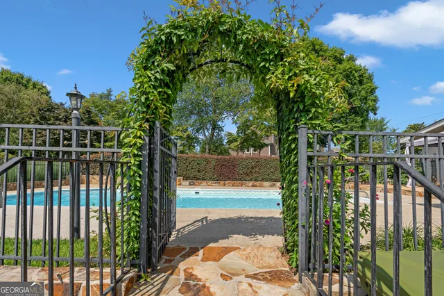 an aerial view of a houses with outdoor space
