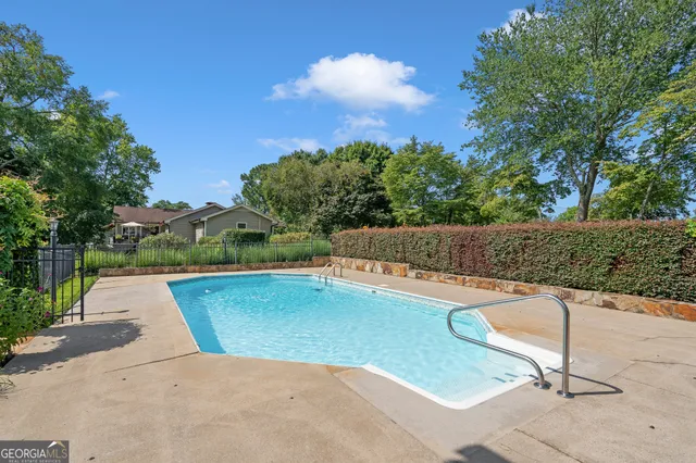 an aerial view of a house with a lake view