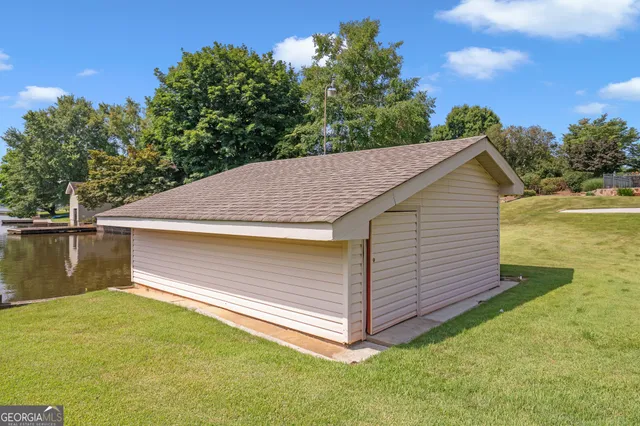 an aerial view of residential house with outdoor space