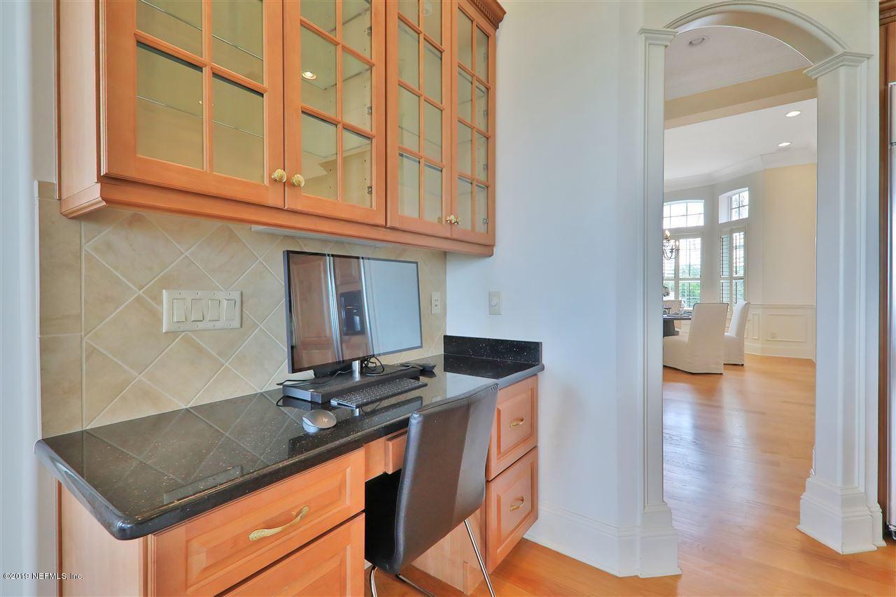 320 View Point Place St. Augustine, FL 32080 - Photo 19 of 33 a kitchen with stainless steel appliances granite countertop a stove and a sink