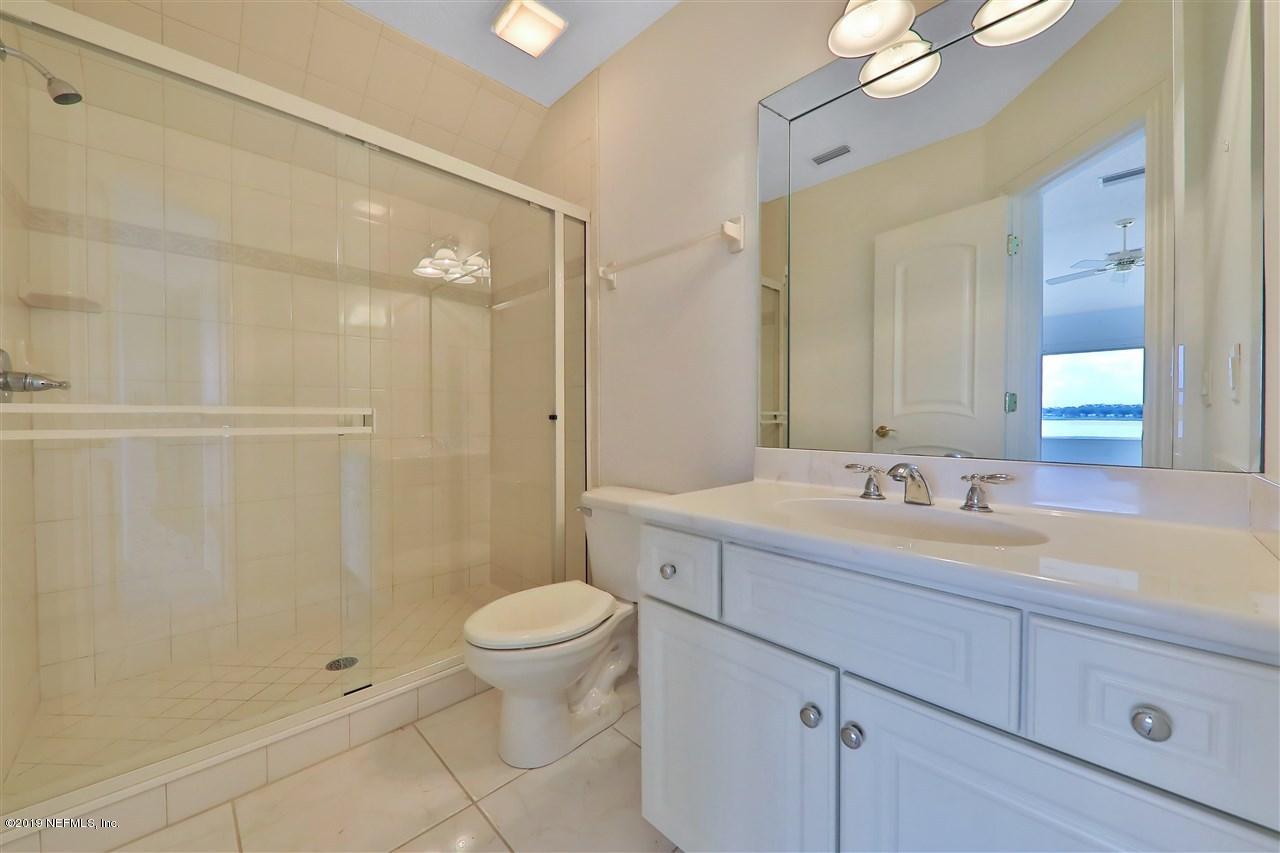 320 View Point Place St. Augustine, FL 32080 - Photo 22 of 33 a bathroom with a sink a toilet and shower