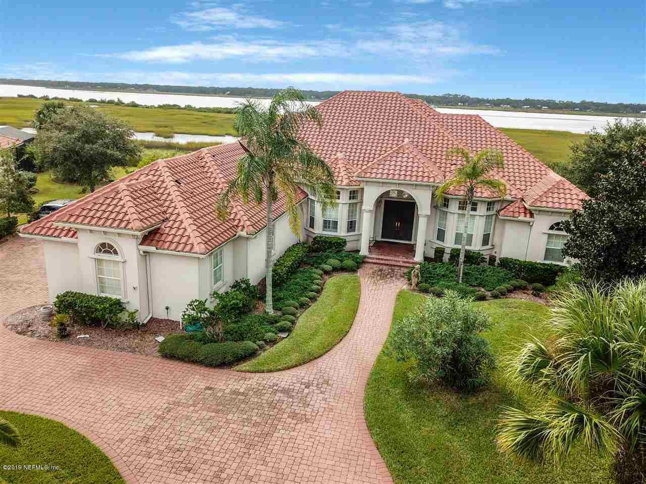 320 View Point Place St. Augustine, FL 32080 - Photo 32 of 33 a front view of house with a garden