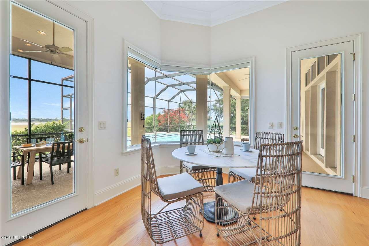 320 View Point Place St. Augustine, FL 32080 - Photo 8 of 33 a dining room with furniture water view and wooden floor