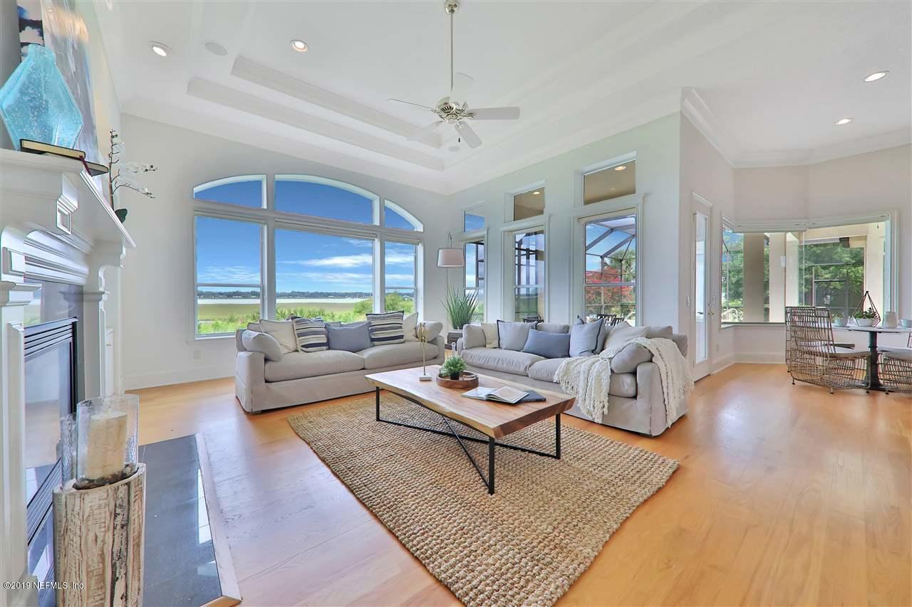 320 View Point Place St. Augustine, FL 32080 - Photo 10 of 33 a living room with furniture and a large window