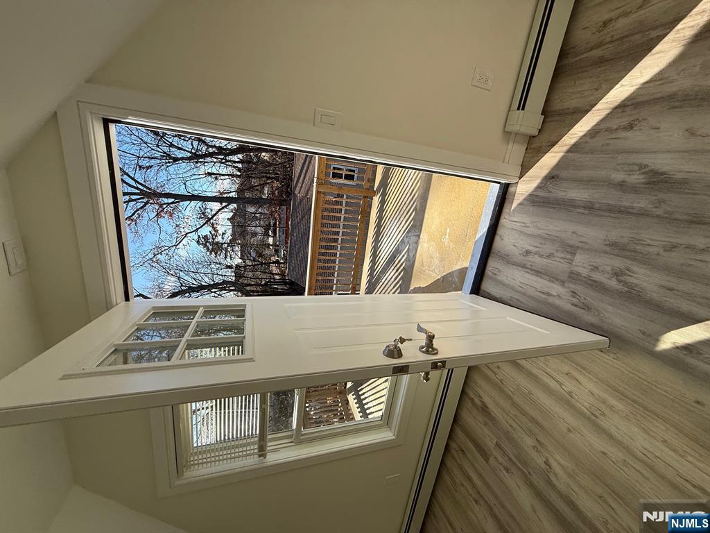 545 Lexington Avenue Clifton, NJ 07011 - Photo 11 of 15 a view of an entryway with a window