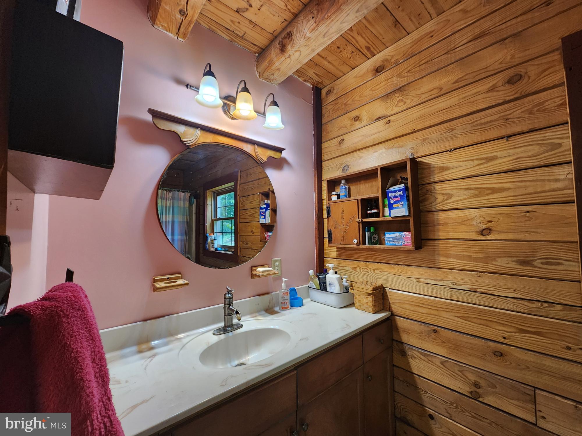 1755 Frenchtown Road Port Deposit, MD 21904 - Photo 16 of 20 a bathroom with a sink vanity and a mirror