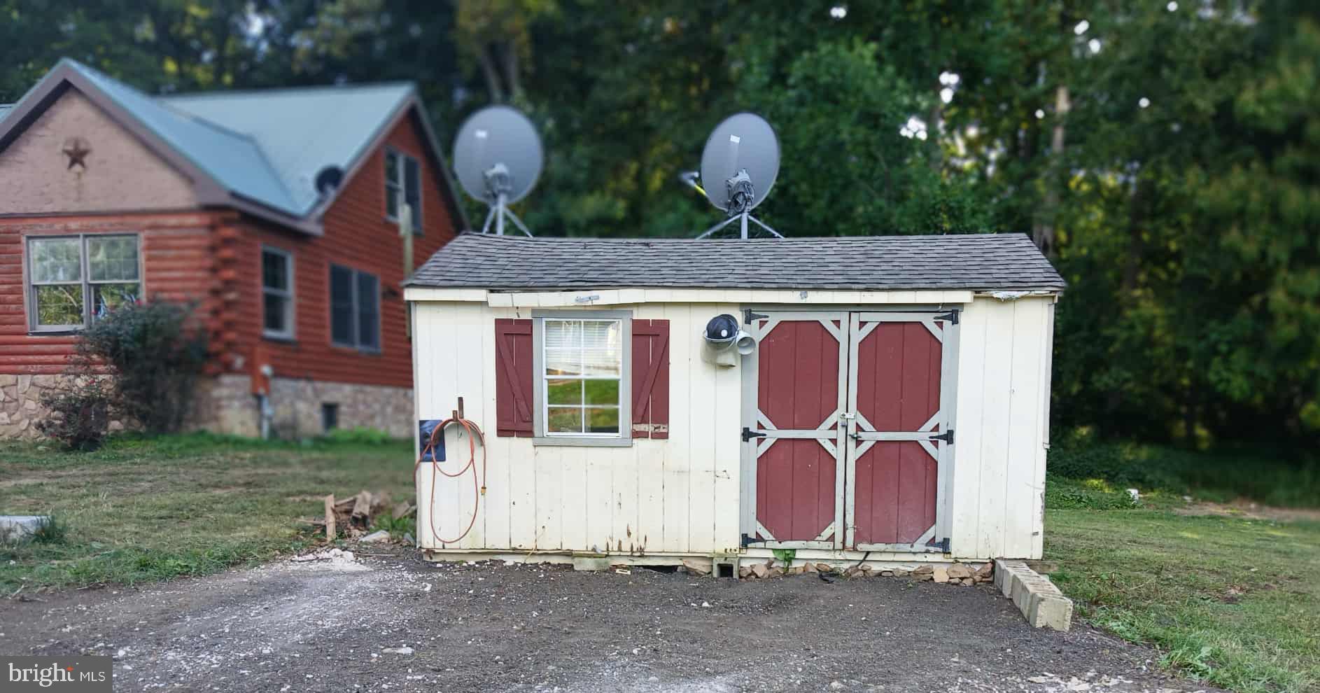1755 Frenchtown Road Port Deposit, MD 21904 - Photo 19 of 20 a front view of a house with garden