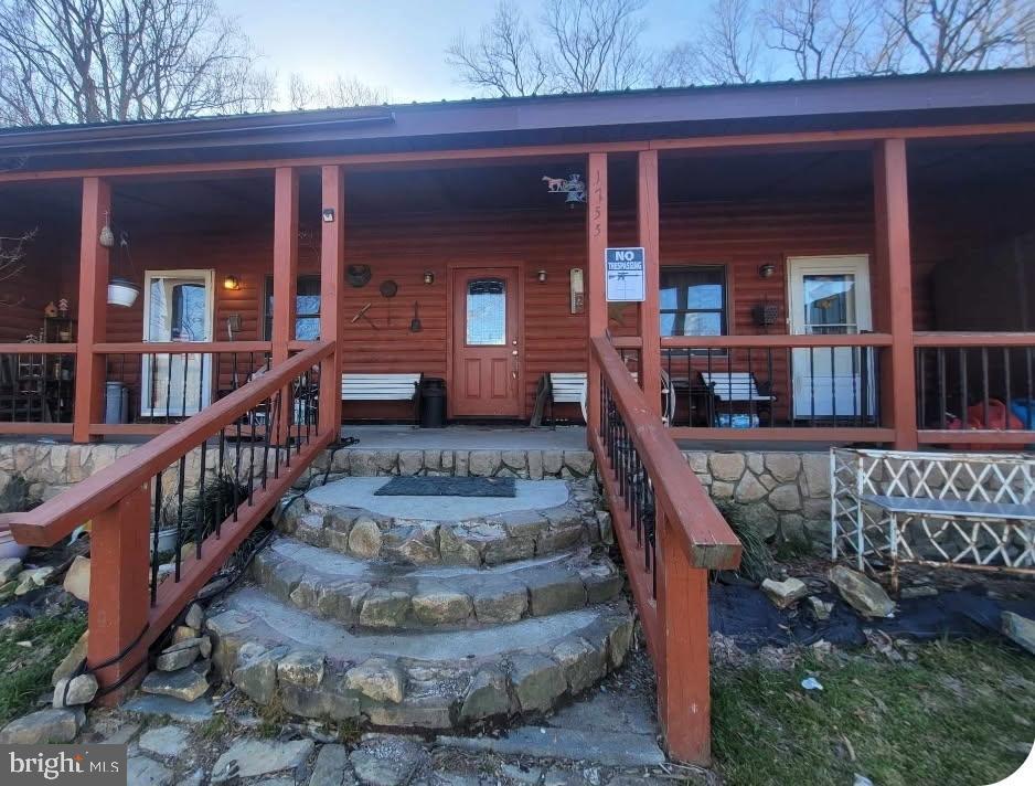 1755 Frenchtown Road Port Deposit, MD 21904 - Photo 3 of 20 a view of a house with wooden stairs