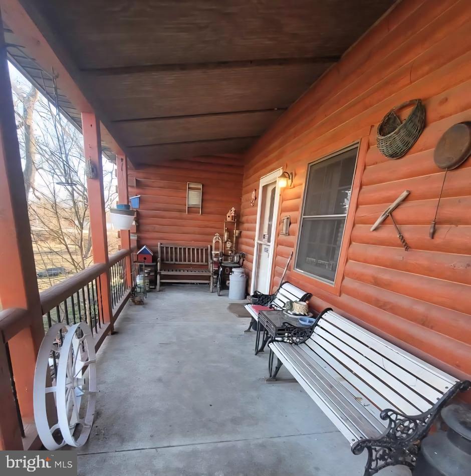 1755 Frenchtown Road Port Deposit, MD 21904 - Photo 5 of 20 a room with lots of white furniture and a window