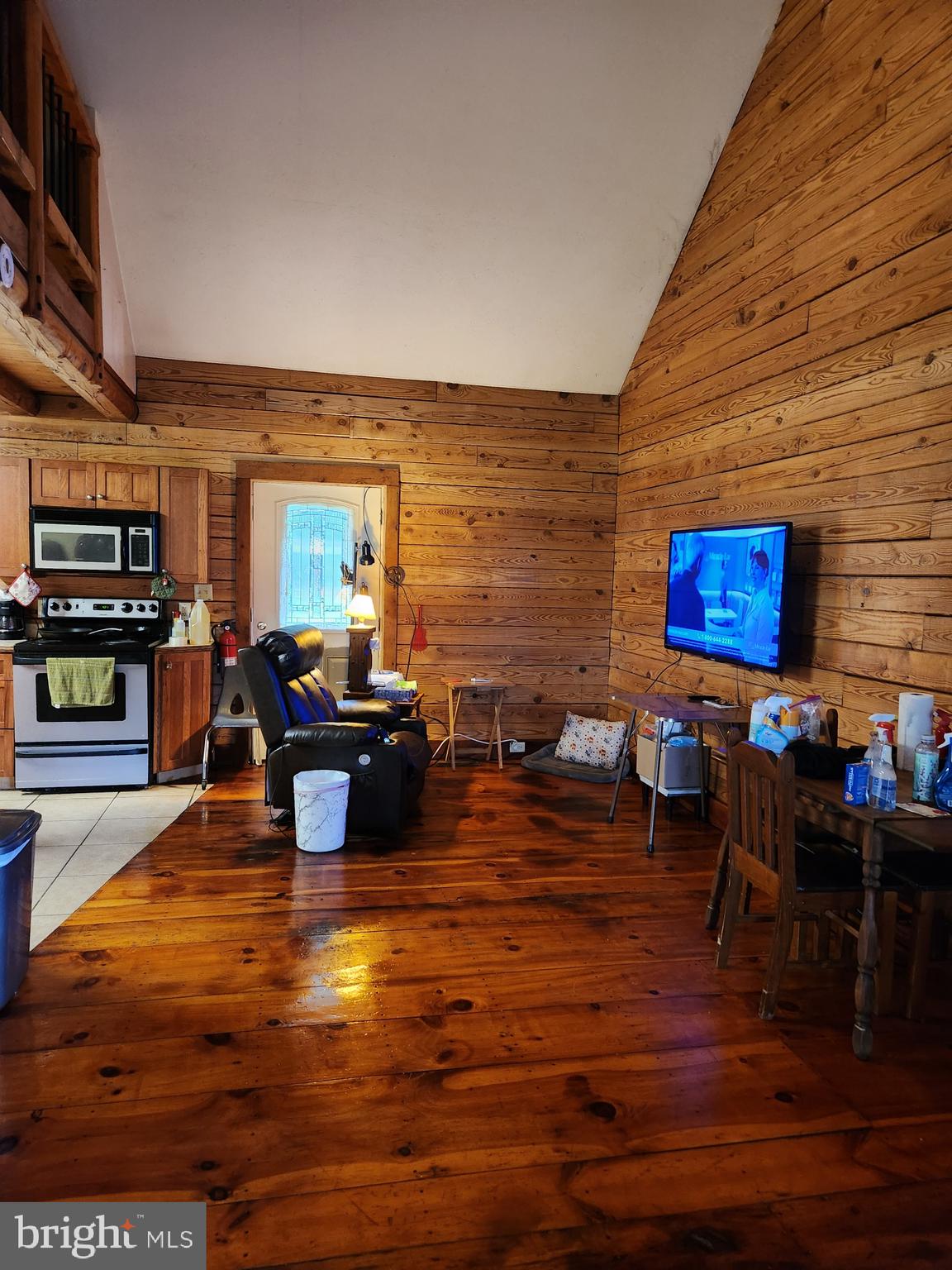 1755 Frenchtown Road Port Deposit, MD 21904 - Photo 8 of 20 a living room with furniture a wooden floor and next to a window