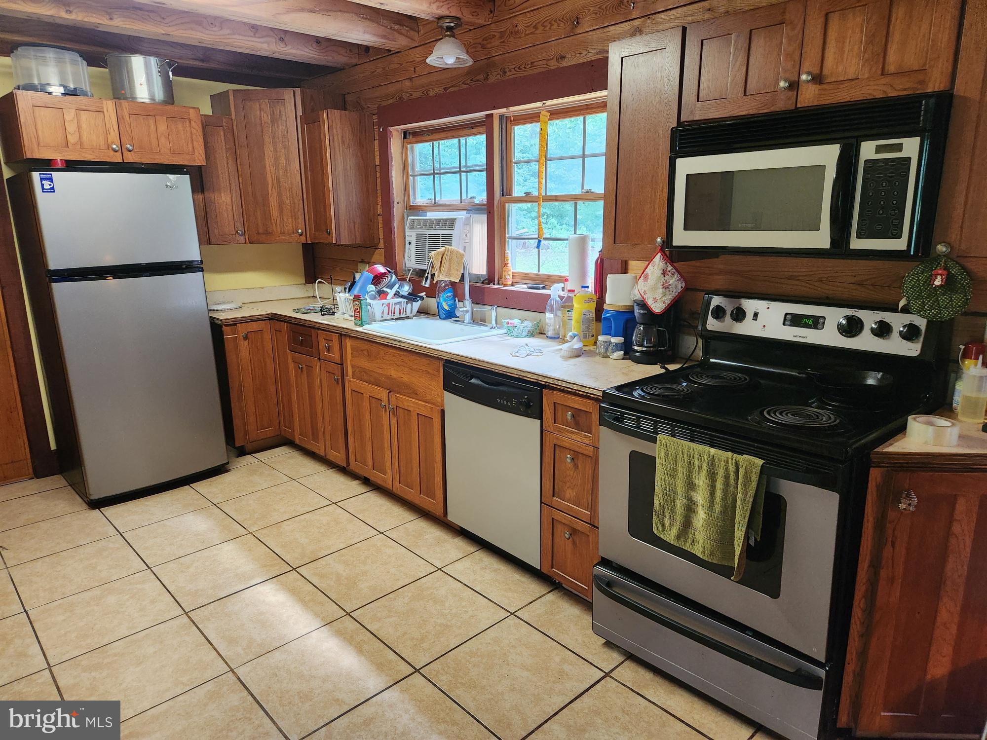 1755 Frenchtown Road Port Deposit, MD 21904 - Photo 9 of 20 a kitchen with stainless steel appliances granite countertop a stove a sink and a microwave