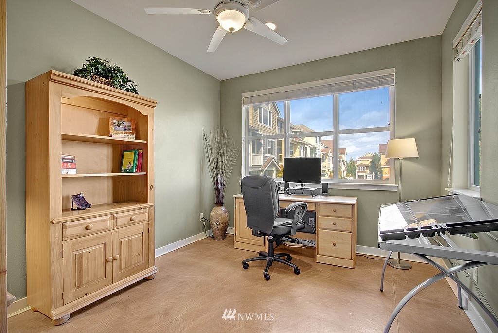559 Alpine Ridge Place Northwest Issaquah, WA 98027 - Photo 6 of 15 a view of a workspace with furniture