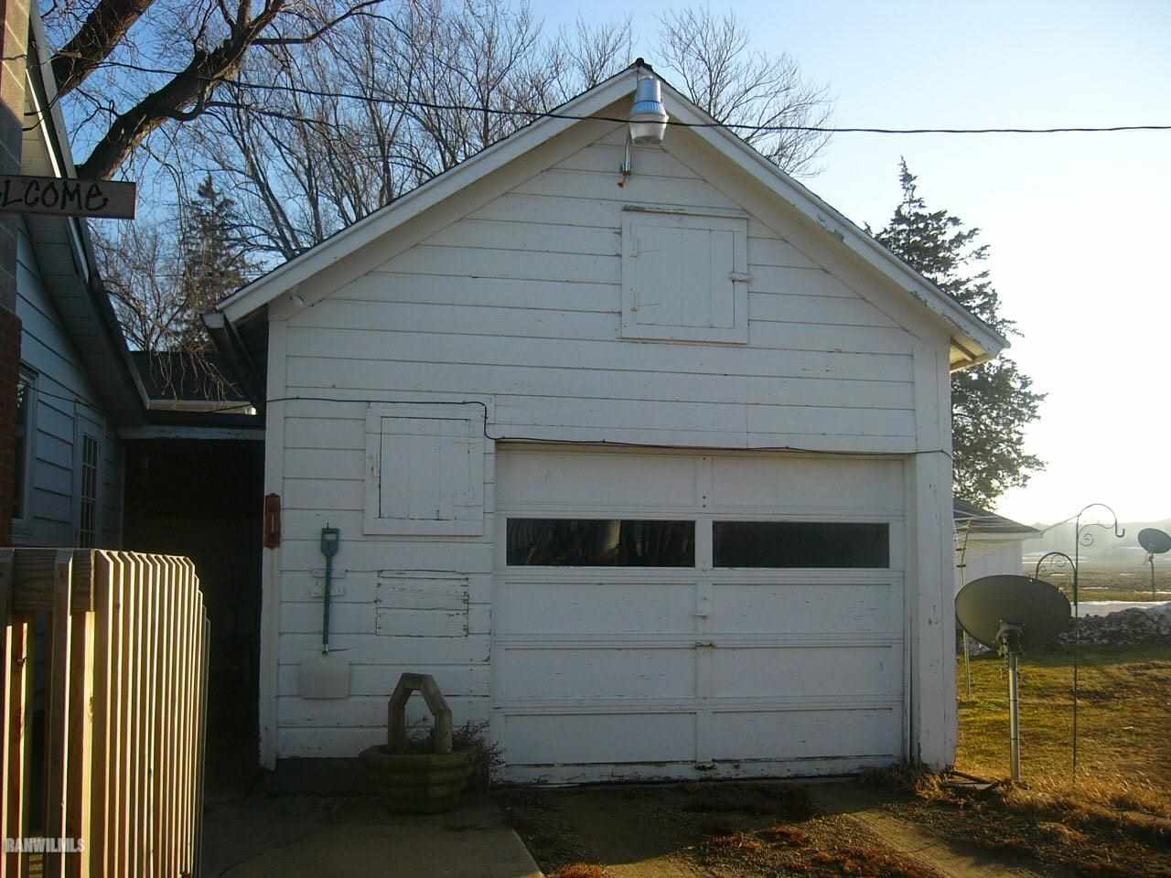 682 North Kent Road Kent, IL 61044 - Photo 8 of 13 a front view of a house with garage