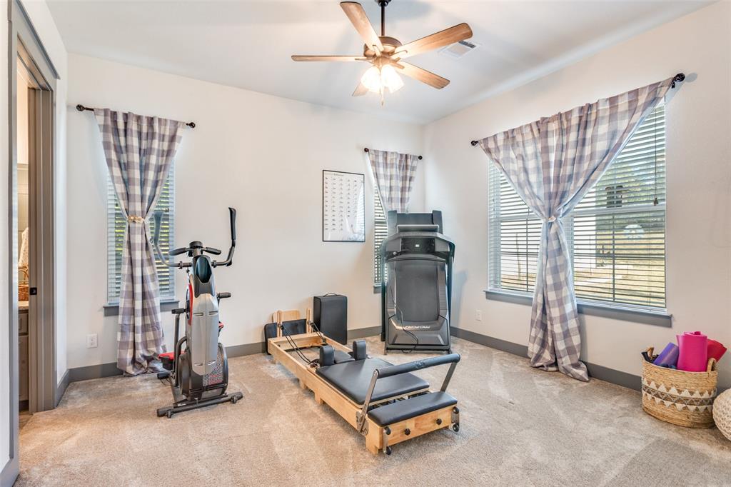 216 Deer Glade Court Azle, TX 76020 - Photo 27 of 40 a living room with furniture a air conditioner vent and a window