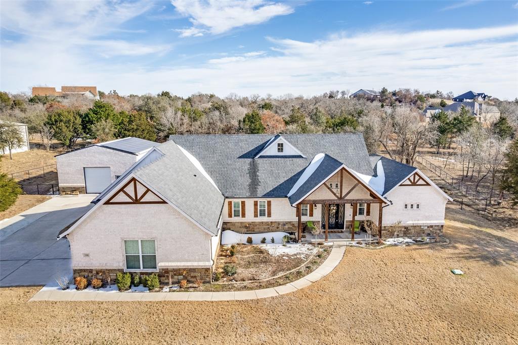 216 Deer Glade Court Azle, TX 76020 - Photo 3 of 40 a view of house with outdoor space and sitting area