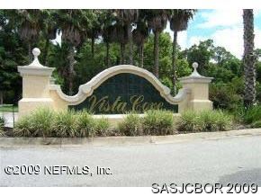 3308 Haley Pointe Road, Unit 3308 St. Augustine, FL 32084 - Photo 1 of 1 a front view of a house with garden
