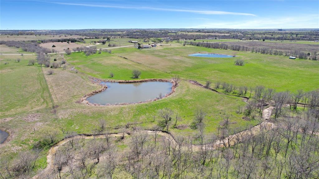 7655 Rawhide Road Celina, TX 75009 - Photo 9 of 10 an aerial view of beach and residential houses with outdoor space