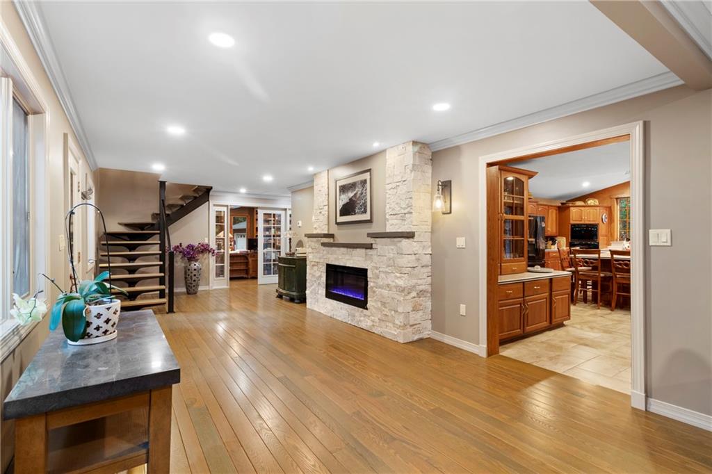 0 Rockton Rockton, PA 15856 - Photo 11 of 50 a hallway with wooden floor and a kitchen view