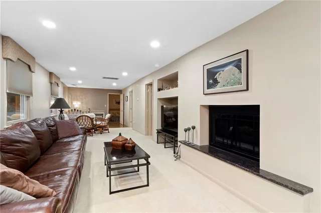 a bathroom with a toilet sink and shower