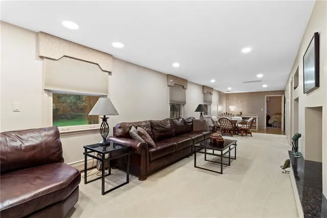 a bed room with a bed and a painting