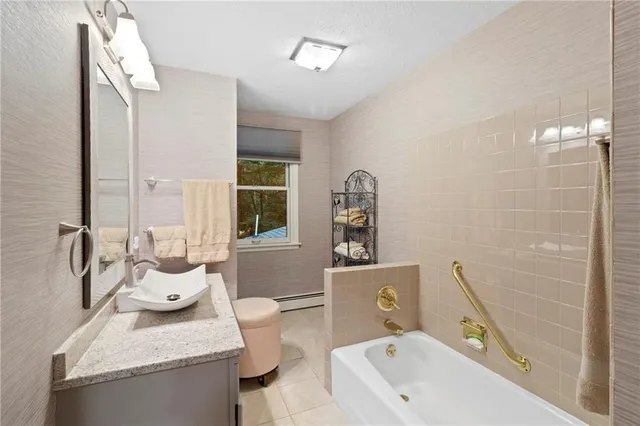 a view of outdoor sitting area with furniture and wooden floor