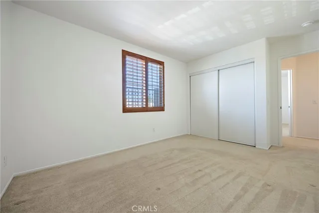 wooden floor and closet in a room