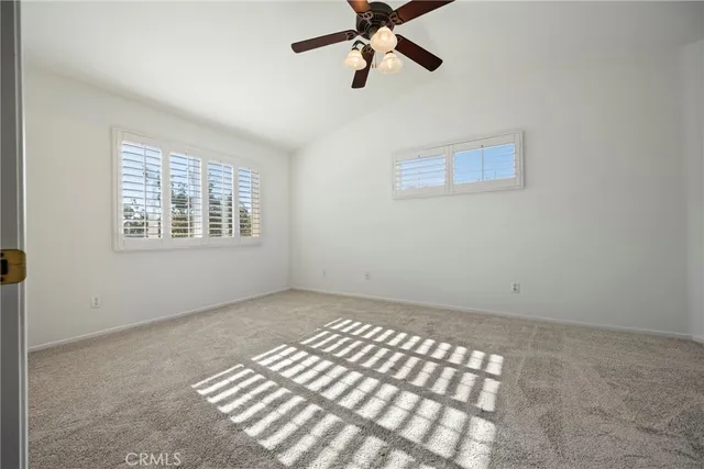 a spacious bathroom with a double vanity sink mirror and next to a window